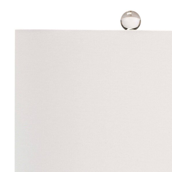 White linen shade and crystal finial of white coral table lamp